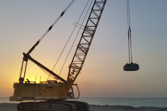 Crawler crane lifting load – crane rental Dubai services